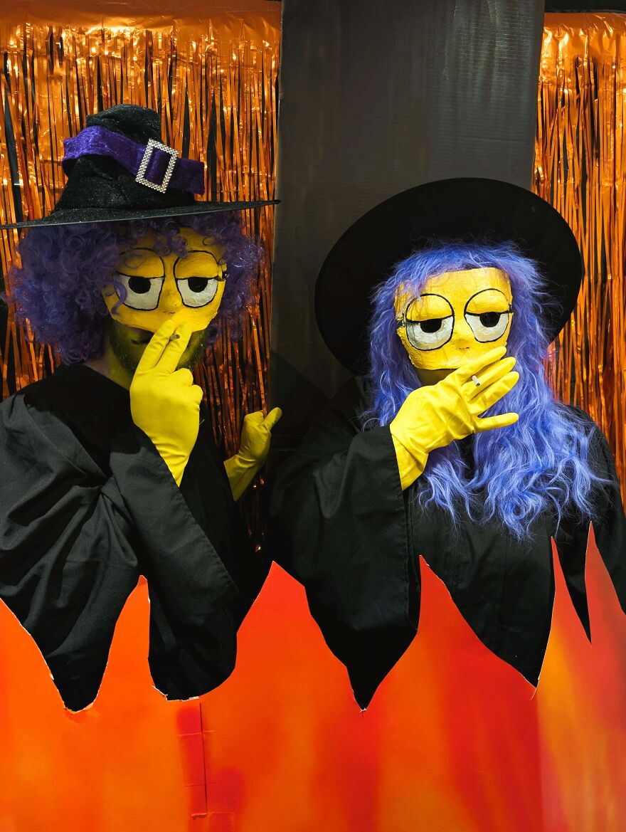 Two people dressed as Patty and Selma from The Simpsons for a creative Halloween costume idea.
