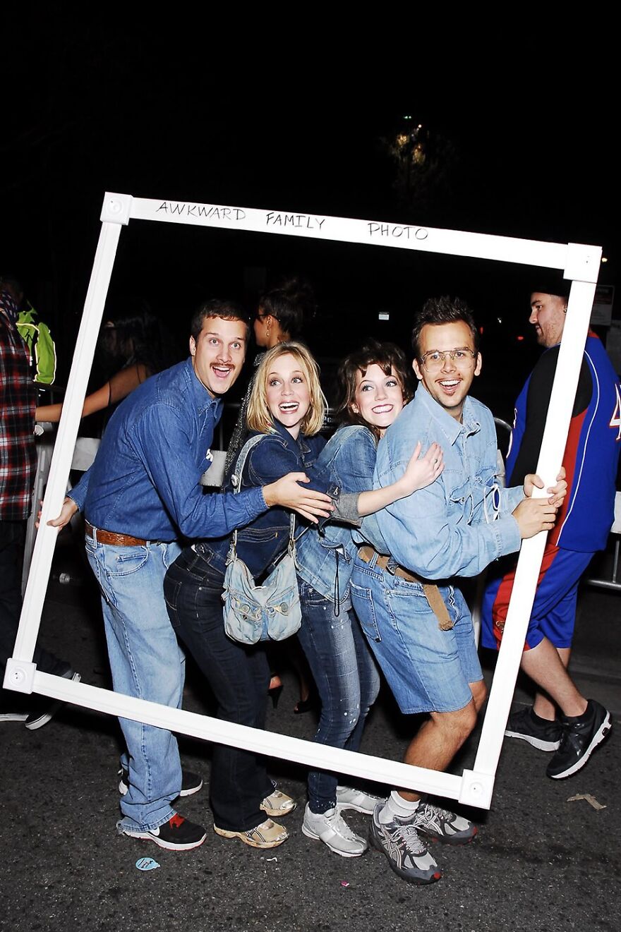 Group posing in denim outfits inside a frame for creative Halloween costumes inspiration