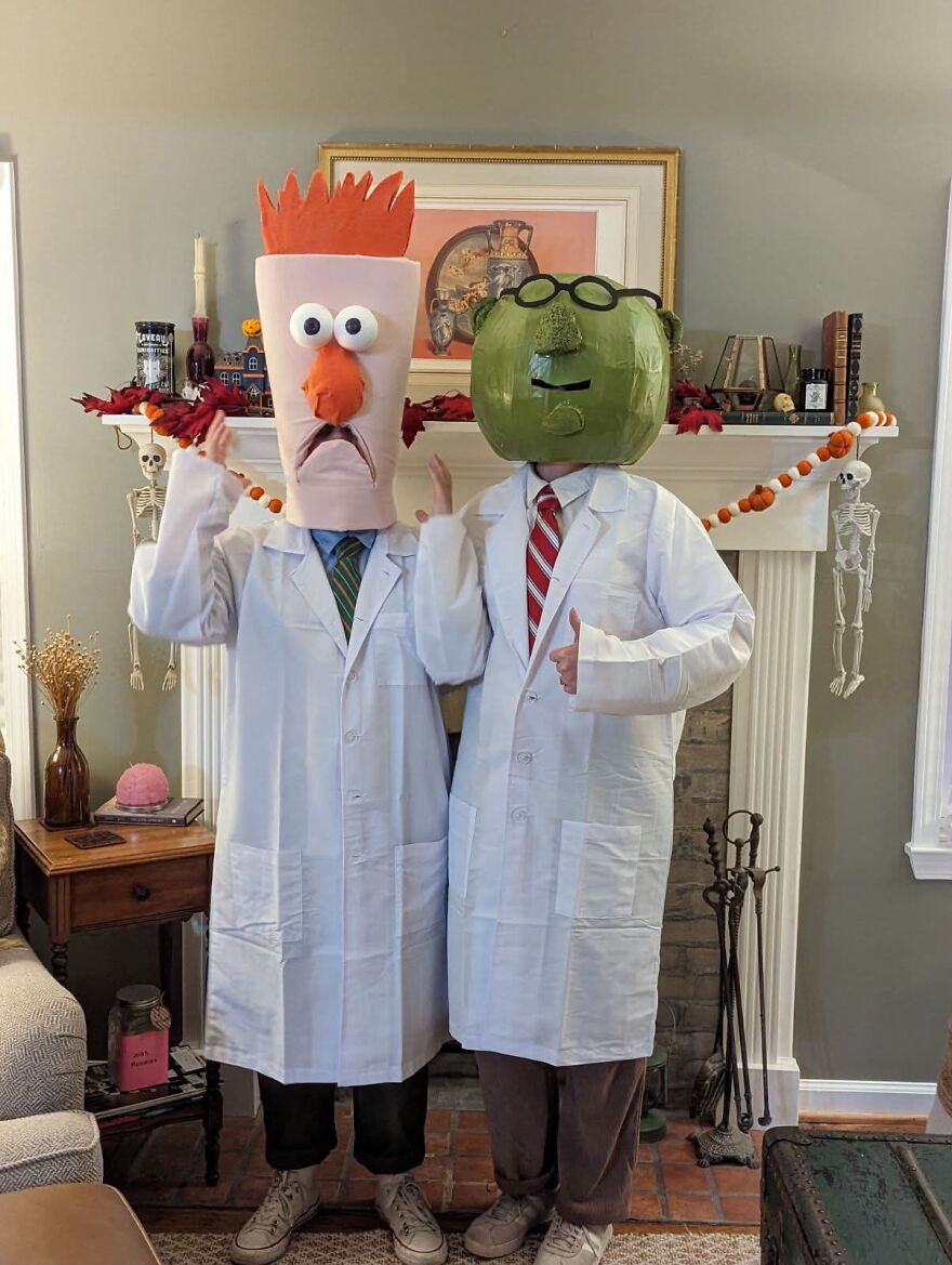Two people dressed in impressive Beaker and Dr. Bunsen Honeydew Muppets Halloween costumes