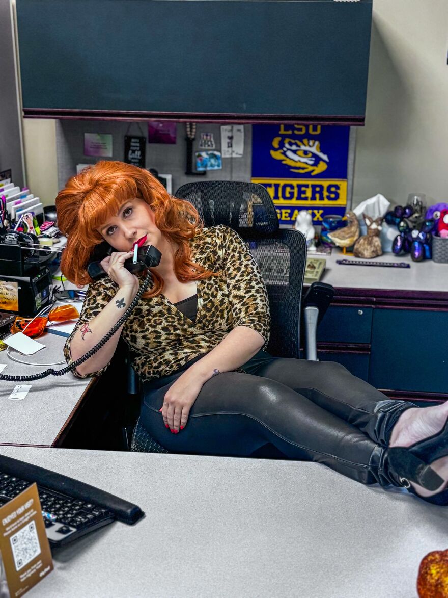 Woman in leopard print shirt dressed up as Peg Bundy, displaying creative Halloween costumes