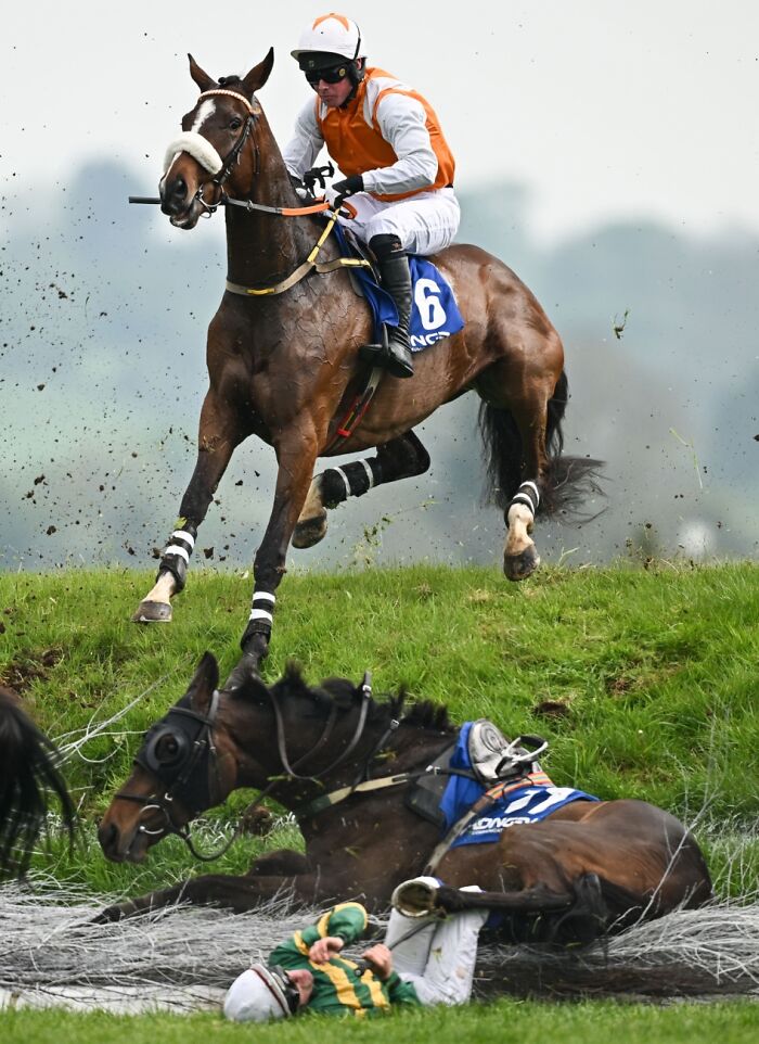 Horse race photo showing a fall during the 2026 Siena International Photo Awards event