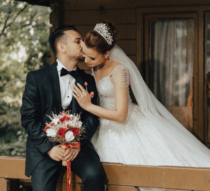 Bride and groom sharing romantic moment in wedding photos Bride and groom sharing romantic moment in wedding photos