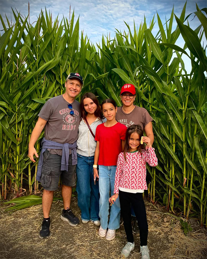 Chad Lowe and family pose together in front of a cornfield, before Fiona's tragic passing.