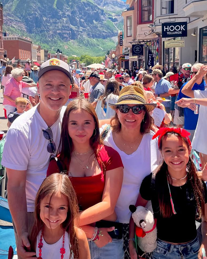 Chad Lowe smiles alongside his family, including late daughter Fiona, at an outdoor street event.