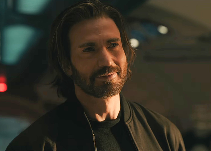 Chris Evans smiling in a black jacket from a new promo clip Chris Evans smiling in a black jacket from a new promo clip