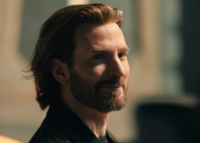 Actor Chris Evans smiling with a beard in a promo appearance Actor Chris Evans smiling with a beard in a promo appearance