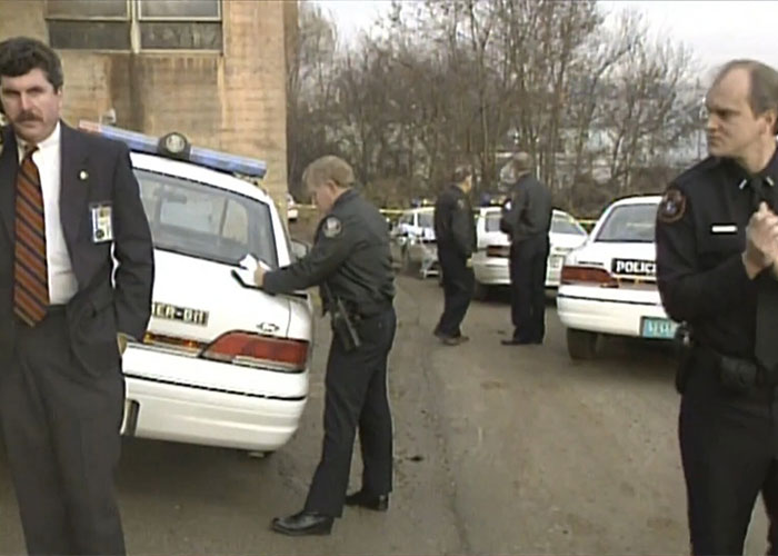 Police officers at a crime scene linked to Christa Pike