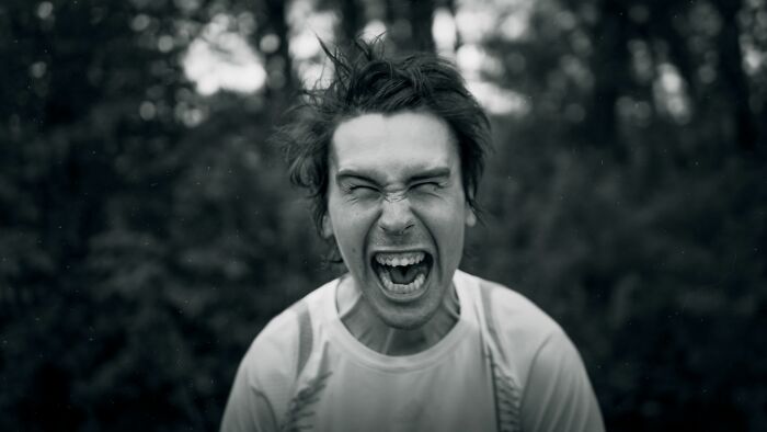 A man screaming in distress, capturing weird things that happen at night
