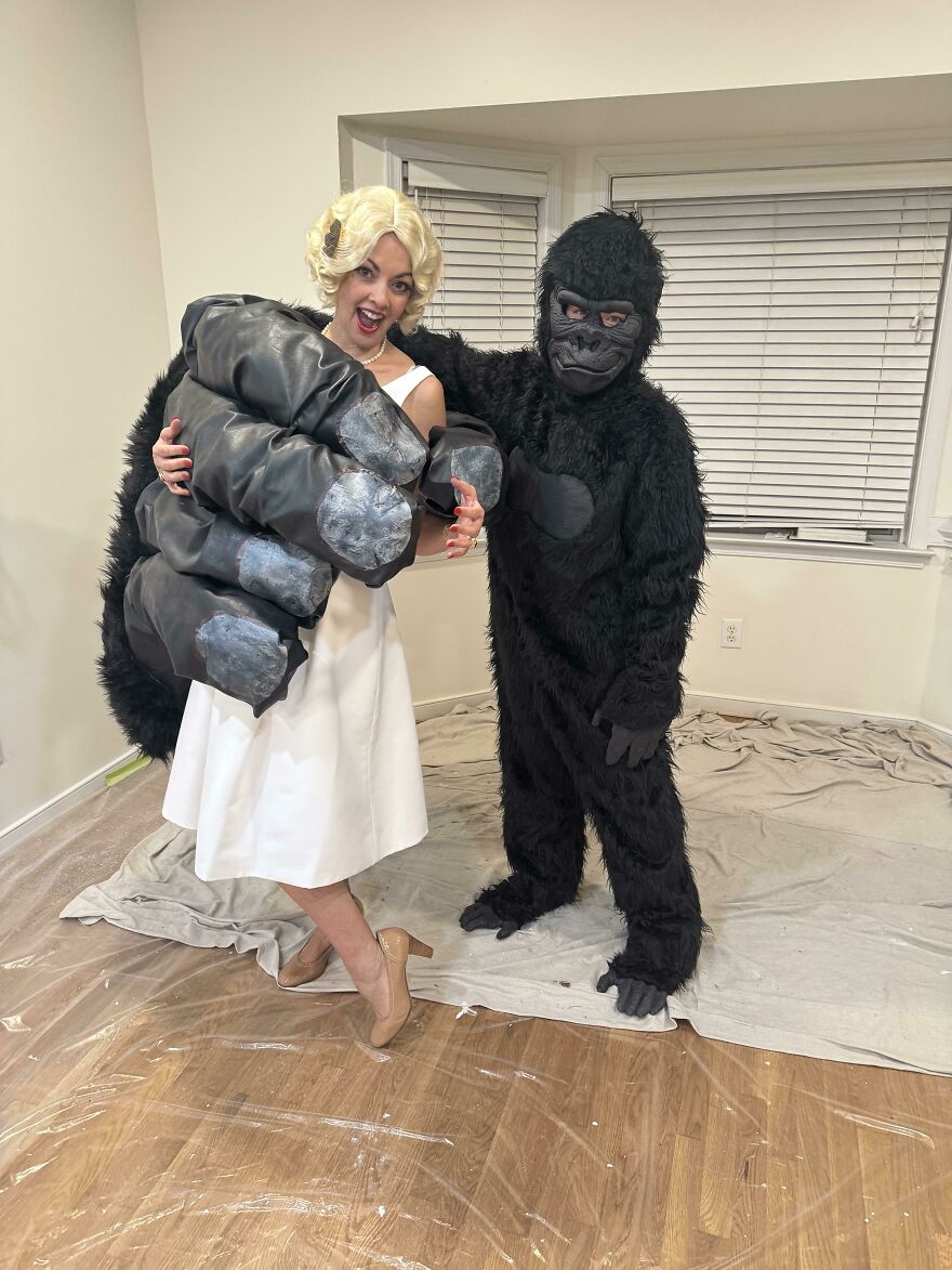 A couple dressed in a King Kong and Ann Darrow theme for creative Halloween costume ideas.
