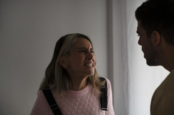 An angry woman arguing with her husband, leading to grounds for divorce over her behavior toward stepchild.