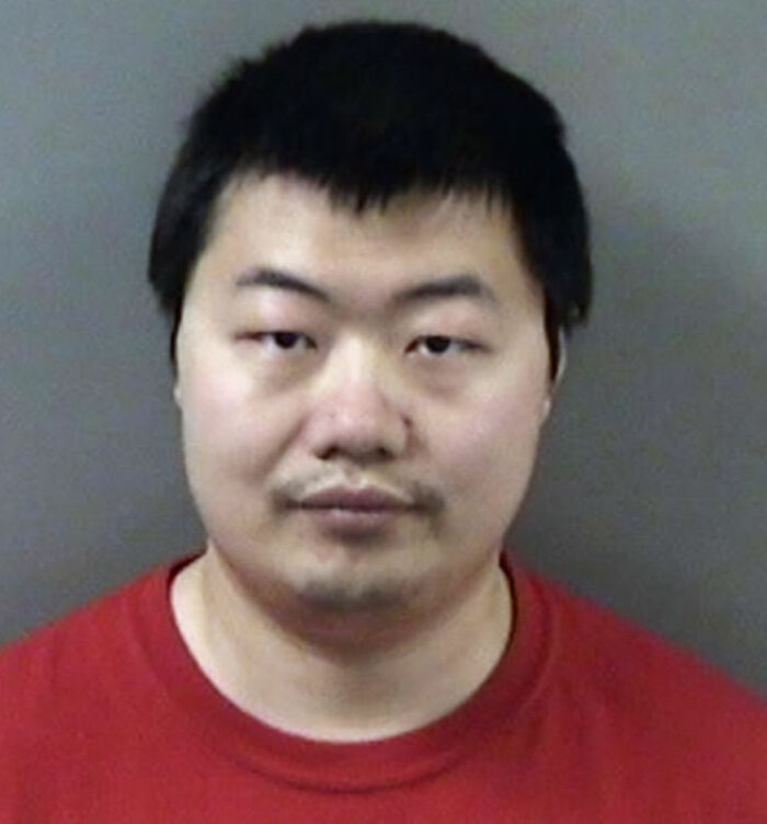 Mugshot of the suspect caught after a woman hid a spy camera at work to explain her health problems. Mugshot of the suspect caught after a woman hid a spy camera at work to explain her health problems.