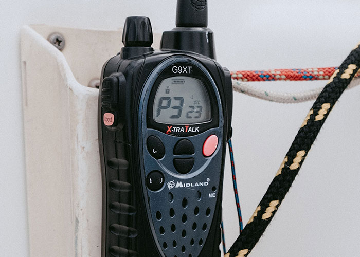 A black Midland walkie-talkie handheld radio connected to online mysteries.