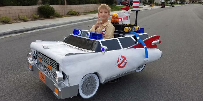 Boy in Ghostbusters Ecto-1 wheelchair costume giving thumbs up, featured among creative people with disabilities