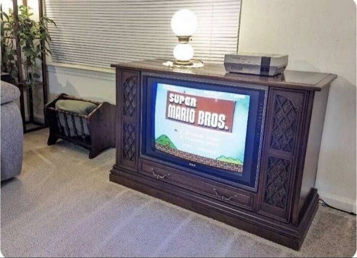A vintage console television displaying Super Mario Bros, evoke nostalgic photo memories for 80s kids childhoods.
