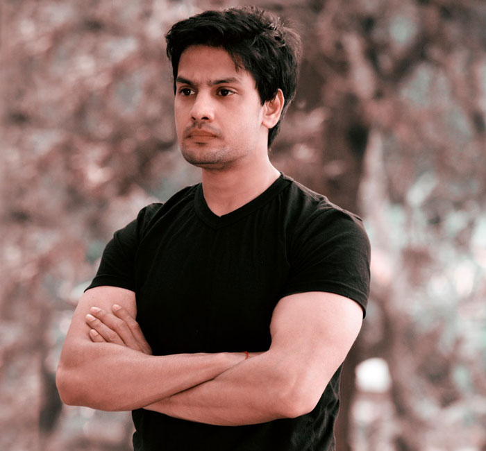 A man with arms crossed looking concerned after a neighbor advertises access to private property for a paid tour.
