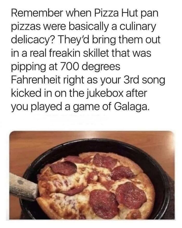 A hot personal pan pizza served in a skillet, capturing nostalgic photos of 80s kids dining.