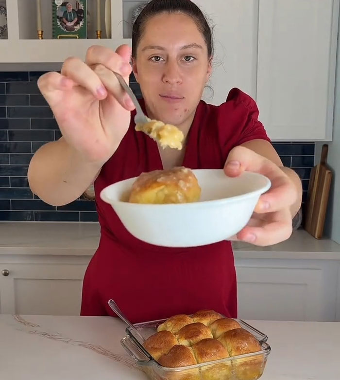 Lovina Zook serving a freshly baked treat in her kitchen while sharing her journey growing up Amish. Lovina Zook serving a freshly baked treat in her kitchen while sharing her journey growing up Amish.