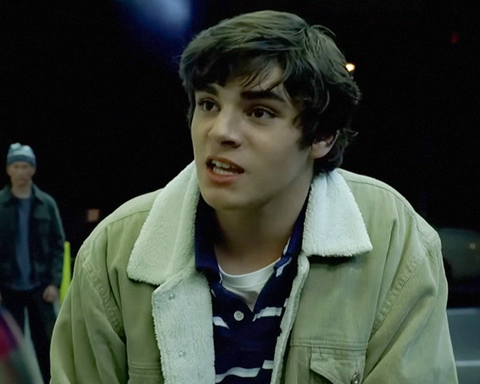 Young RJ Mitte performing in a dramatic scene from a TV show. Young RJ Mitte performing in a dramatic scene from a TV show.