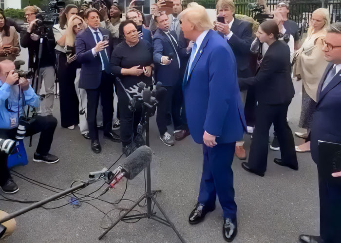 Expert Weighs In After Trump's Odd Stance In Viral Video Leads To Speculation