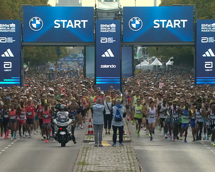 Crowds of runners gathered at the start line of the Berlin marathon Crowds of runners gathered at the start line of the Berlin marathon