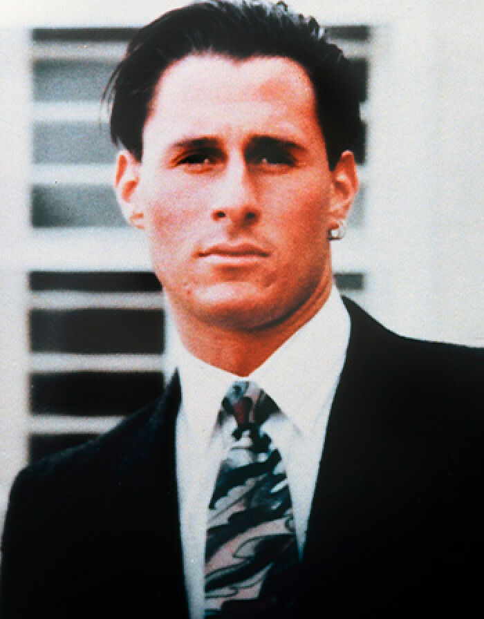 Portrait of Ron Goldman, a key figure in the O.J. Simpson case, wearing a suit and tie. Portrait of Ron Goldman, a key figure in the O.J. Simpson case, wearing a suit and tie.
