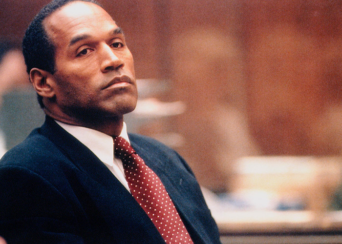 Close-up of O.J. Simpson looking thoughtful during court proceedings. Close-up of O.J. Simpson looking thoughtful during court proceedings.