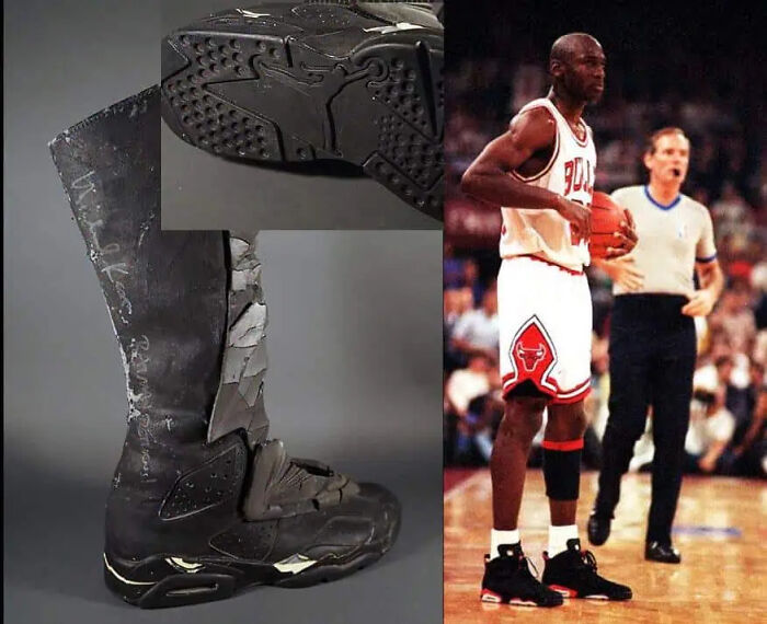 Michael Jordan next to a modified Nike sneaker used as a movie prop in Batman.
