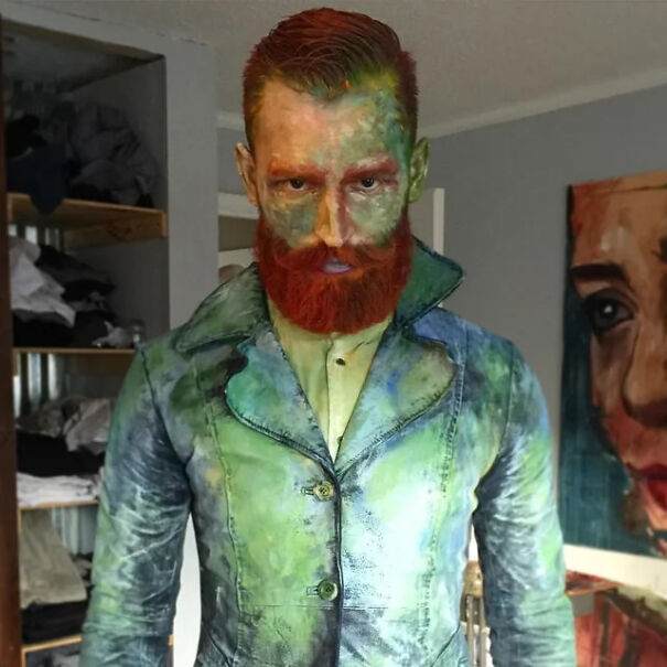 A man dressed as Vincent van Gogh with painted face and jacket for a Halloween costume idea.