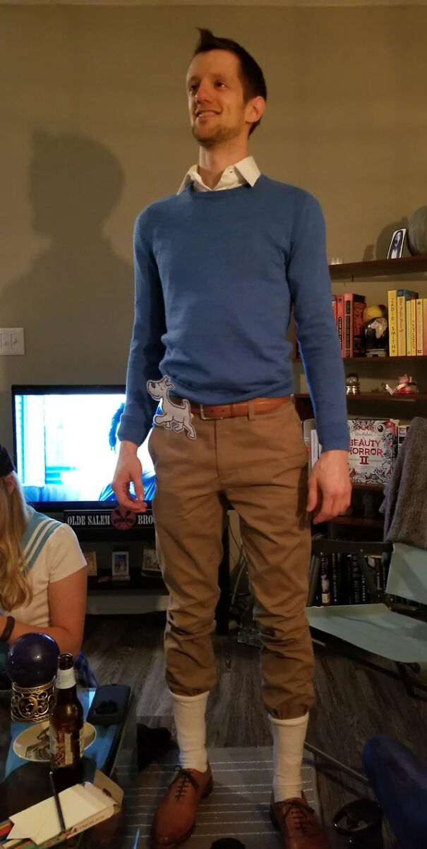 Man dressed as Tintin with a cut out dog for last minute Halloween costume ideas