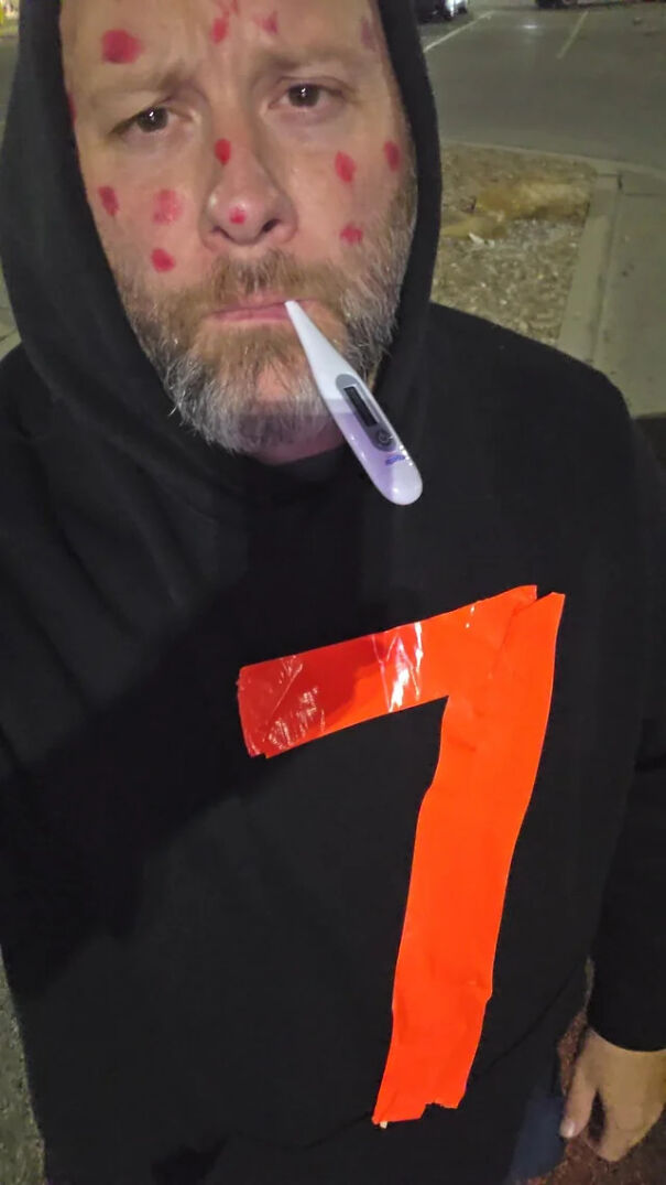 A man wearing a sick digit seven outfit for a funny Halloween costume idea