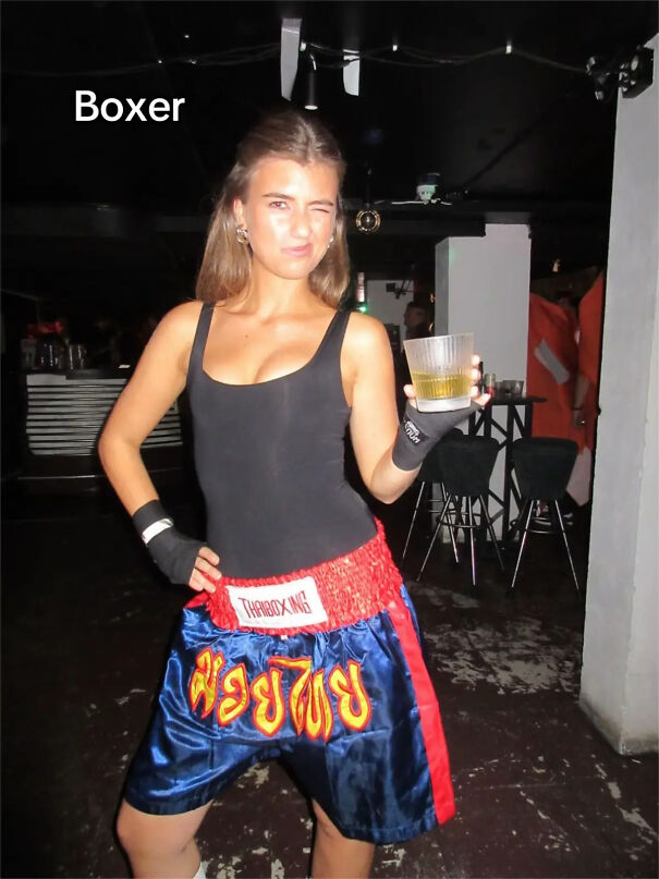 A woman in boxing shorts and hand wraps as a quick boxer Halloween costume idea.