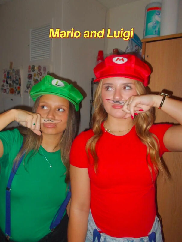 Two friends posing in red and green shirts with matching hats as a Mario and Luigi Halloween costume.