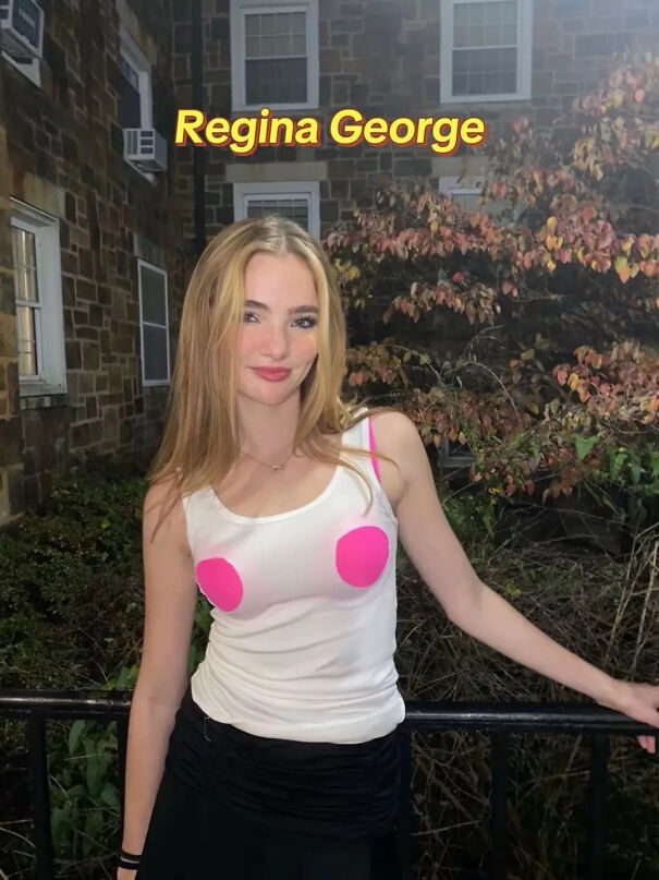 A young woman posing in a Regina George tank top for a simple Halloween costume idea