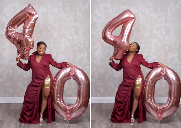 Photoshopper funny edit of a woman posing with large rose gold 40 balloons.