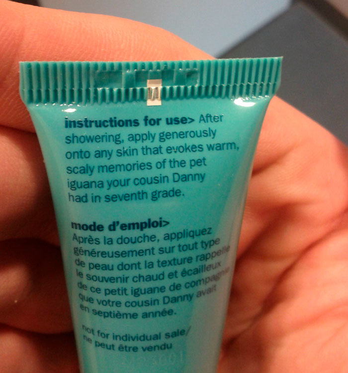 Bottle of lotion featuring hilariously confusing instructions mentioning a pet iguana.