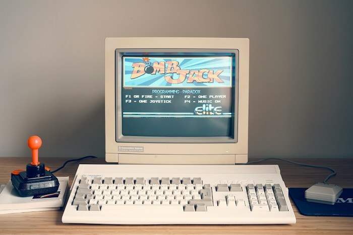Vintage Commodore computer set up on a desk as a rare dumpster find.