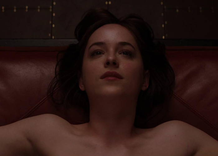 Dakota Johnson lying down looking upward, related to her racy confession Dakota Johnson lying down looking upward, related to her racy confession