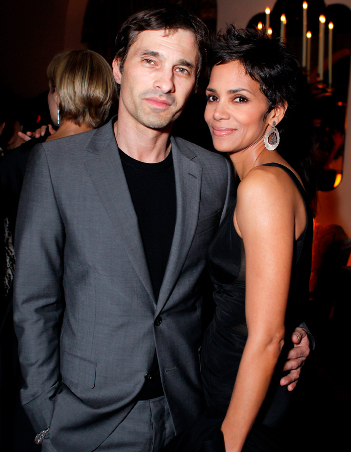 Halle Berry and Olivier Martinez posing together at an event. Halle Berry and Olivier Martinez posing together at an event.