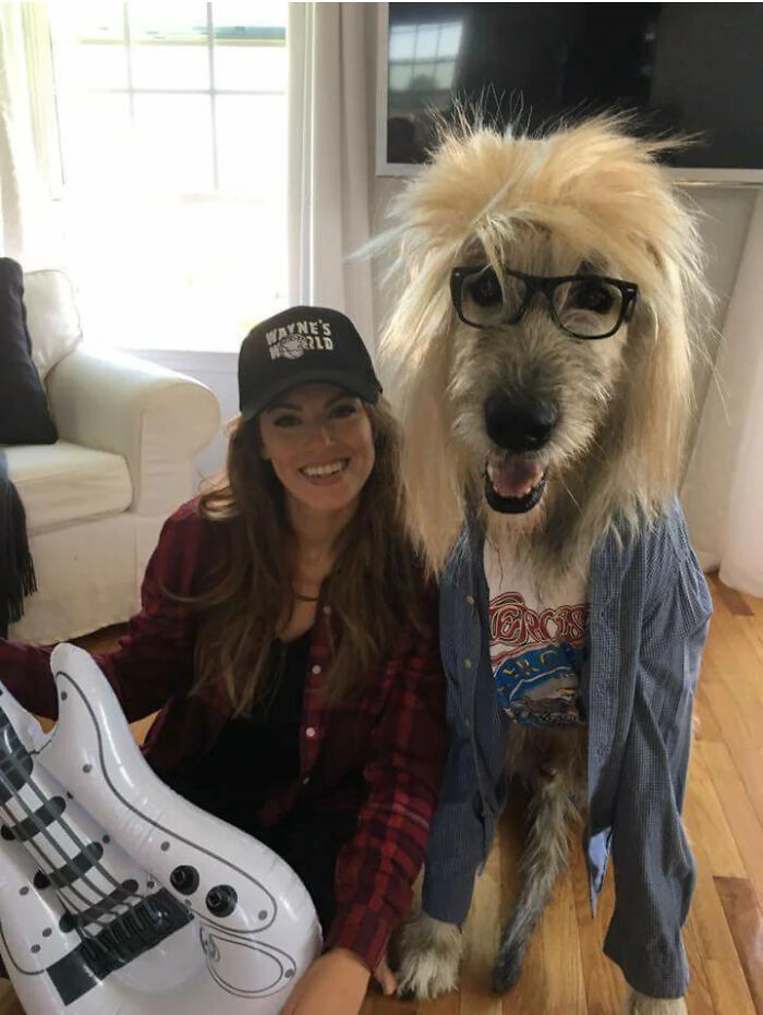 A woman and her large dog dressed up in a Wayne's World duo pet halloween costumes concept