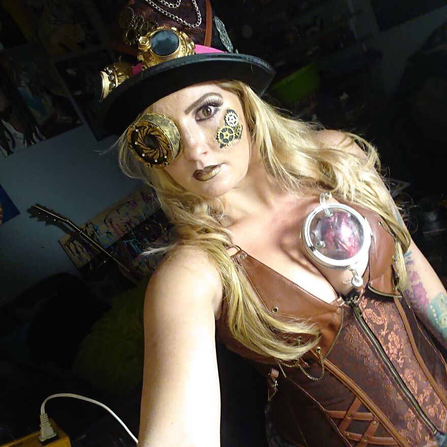 A woman wearing an intricate steampunk outfit with gears and goggles for creative Halloween costume ideas.