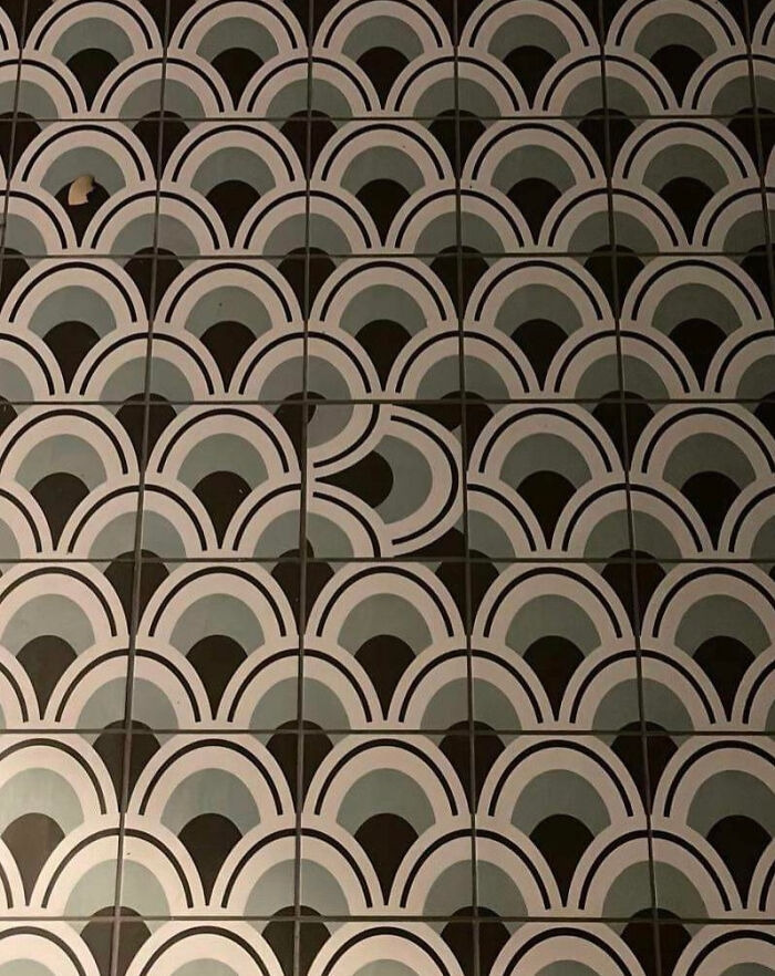 A home renovation tiling fiasco where a single patterned tile is rotated the wrong way.