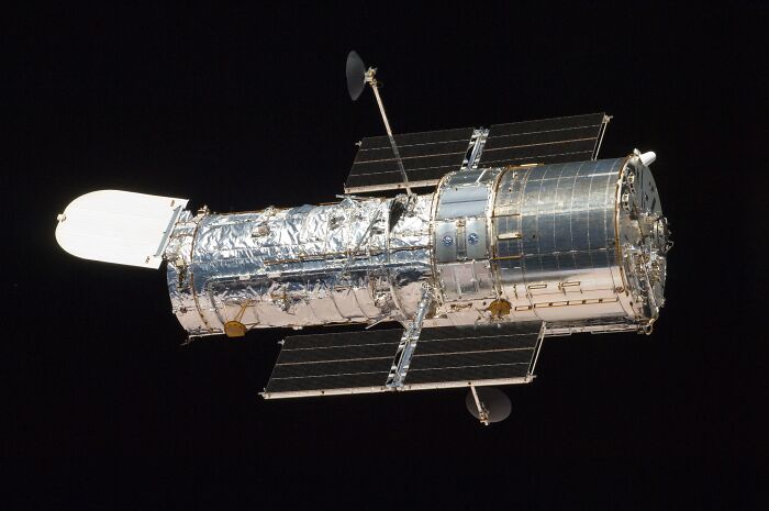 Hubble Space Telescope orbiting in space, subject of small mistakes causing disasters