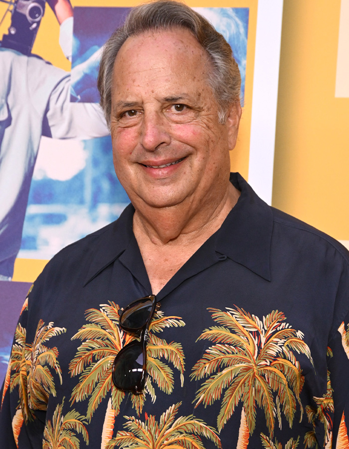 Actor Jon Lovitz wearing a Hawaiian shirt with palm trees at a movie premiere Actor Jon Lovitz wearing a Hawaiian shirt with palm trees at a movie premiere