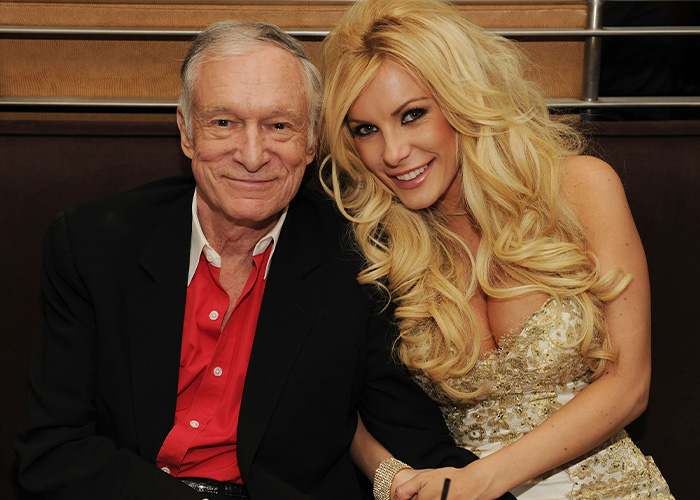 Hugh Hefner posing with his blonde widow Crystal Hefner at an evening gathering Hugh Hefner posing with his blonde widow Crystal Hefner at an evening gathering
