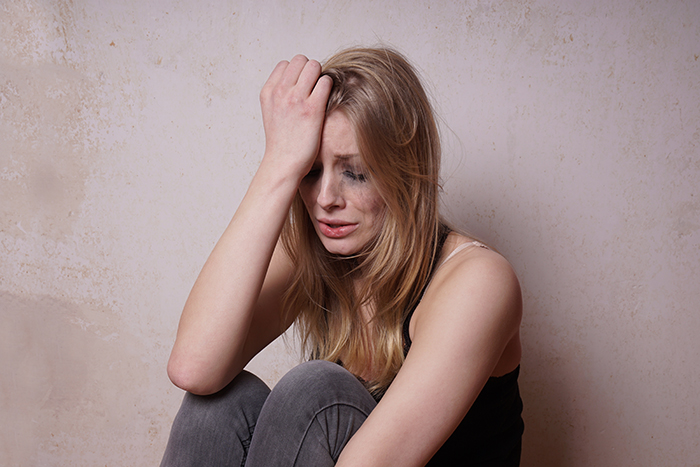 Distressed woman upset over husband's dating app profile