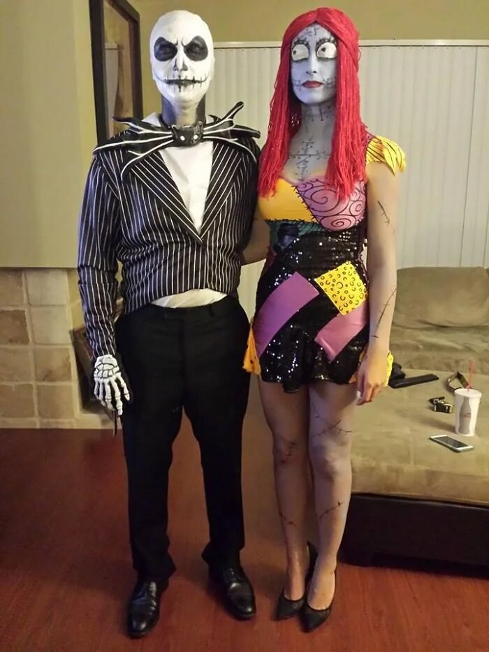 Couple posing as Jack Skellington and Sally, inspiration for funny cool Halloween couples costumes.