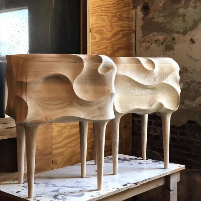 Two sculpted nightstands representing artistic wooden creations