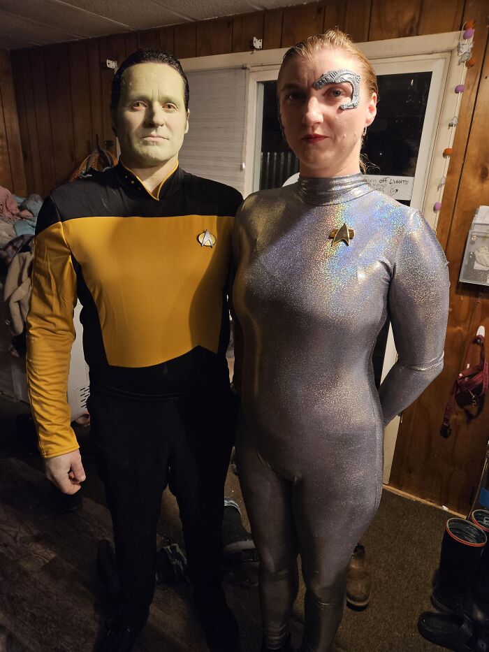 A couple in detailed Star Trek sci-fi theme funny cool Halloween couples costumes standing together