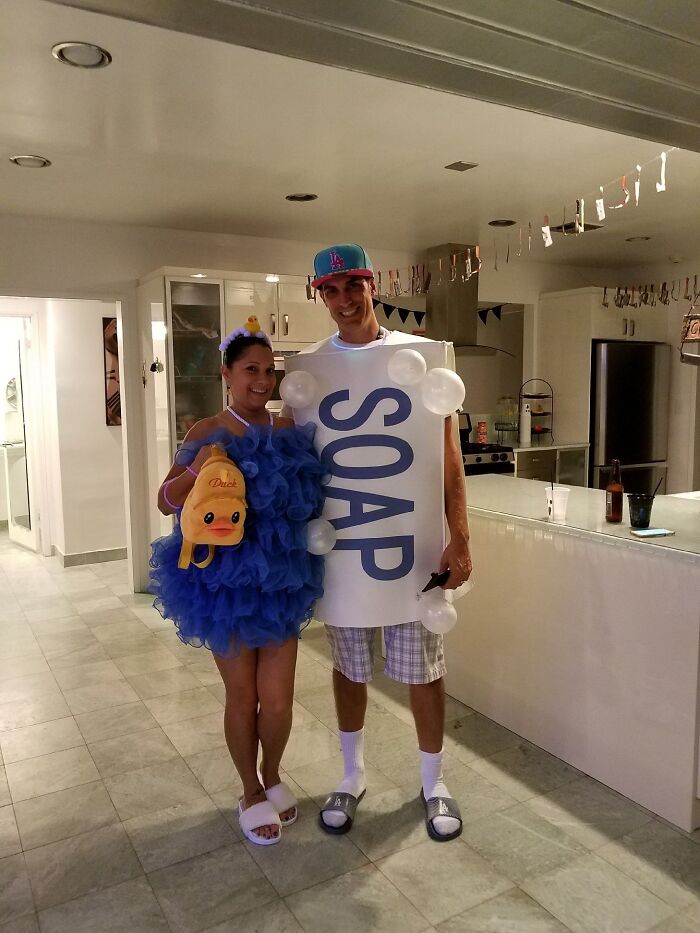 Couple dressed up as soap and a bath loofah wearing funny cool Halloween couples costumes