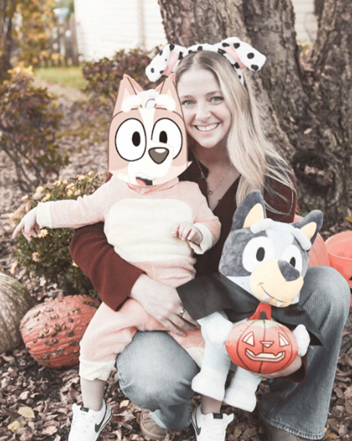 A mother and child posing outdoors in Halloween costumes, related to online discussions about a Beige Mom. A mother and child posing outdoors in Halloween costumes, related to online discussions about a Beige Mom.